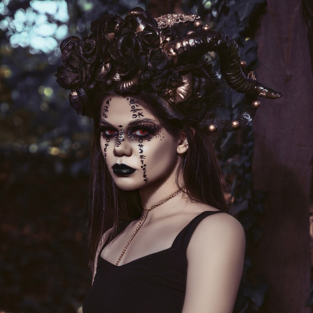 a fantasy artist in full makeup dark woman ideas malificant